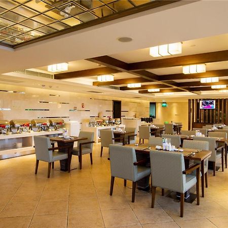 Joya International Hotel Szanja Kültér fotó